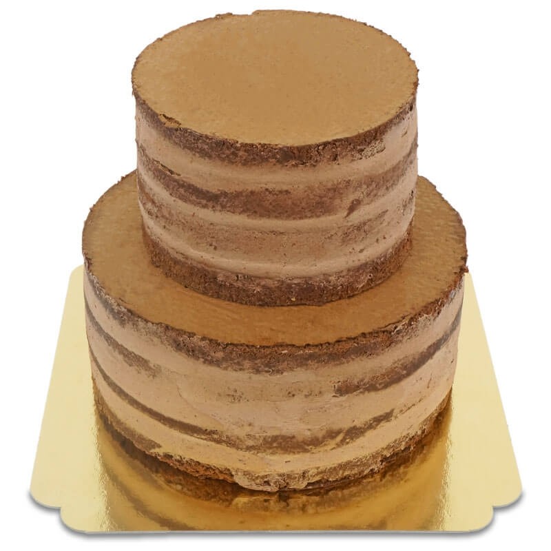 deux Chocolat Gâteaux sur une en bois Coupe planche. généré par ai