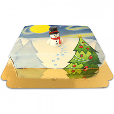 Gâteau paysage enneigé avec figurine bonhomme de neige