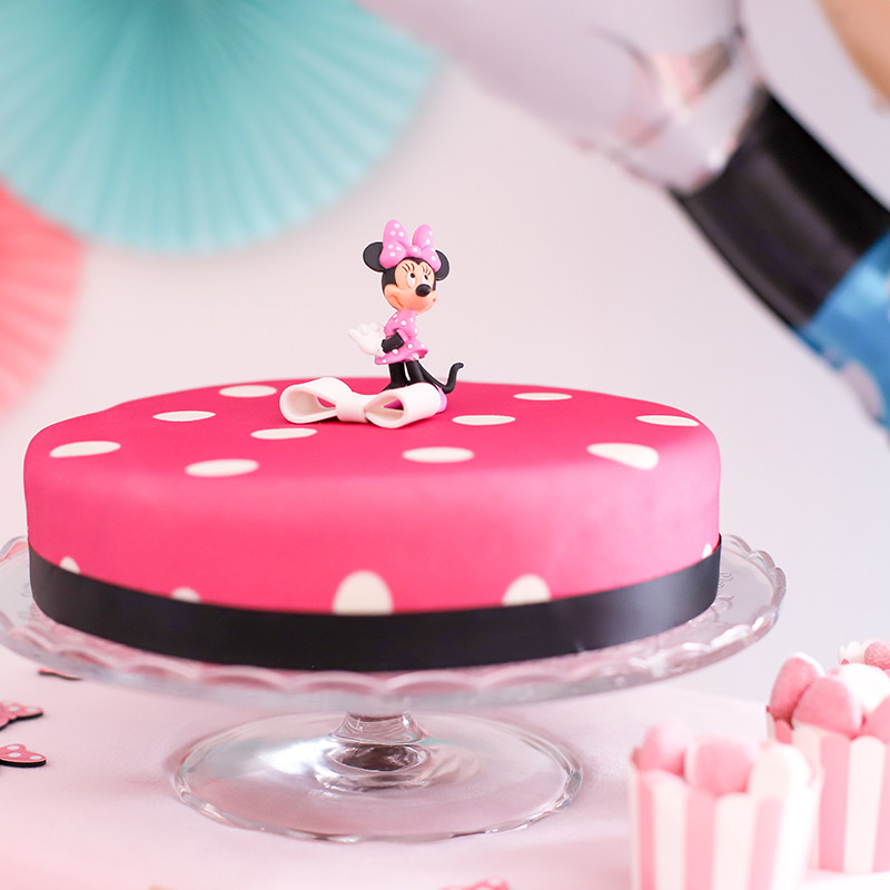 Minnie sur gâteau rose à pois