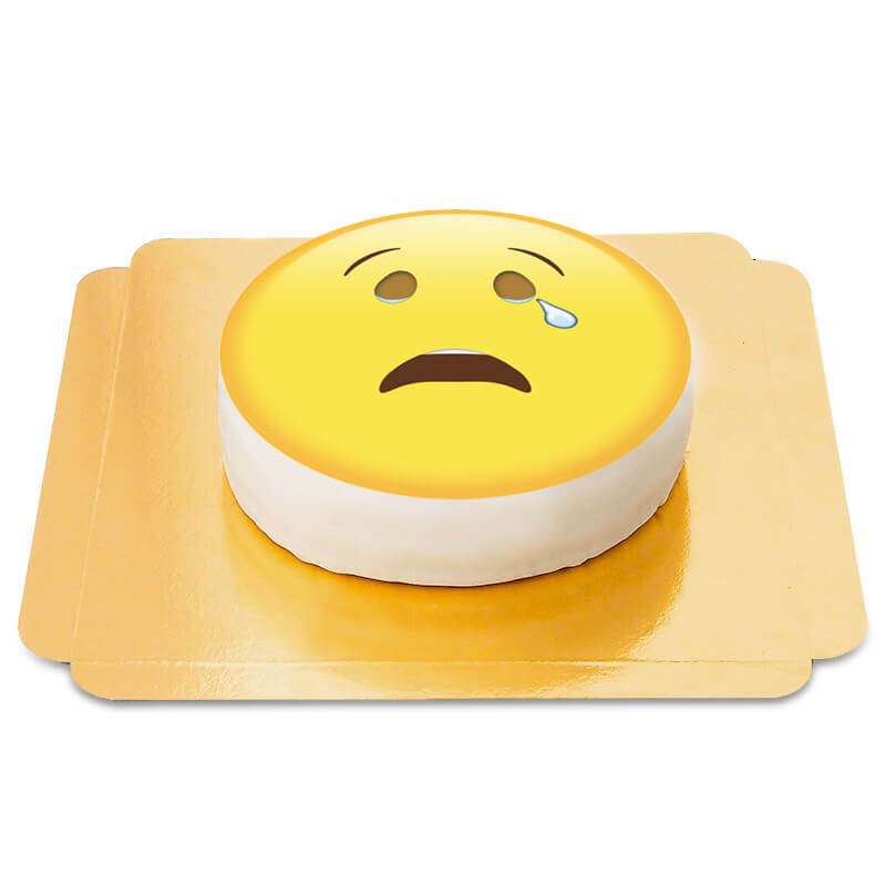 Tort z płaczącą emotikoną