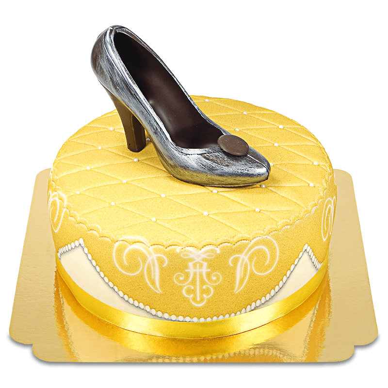 Złoty tort deluxe ze srebrnym czekoladowym pantofelkiem i wstążką