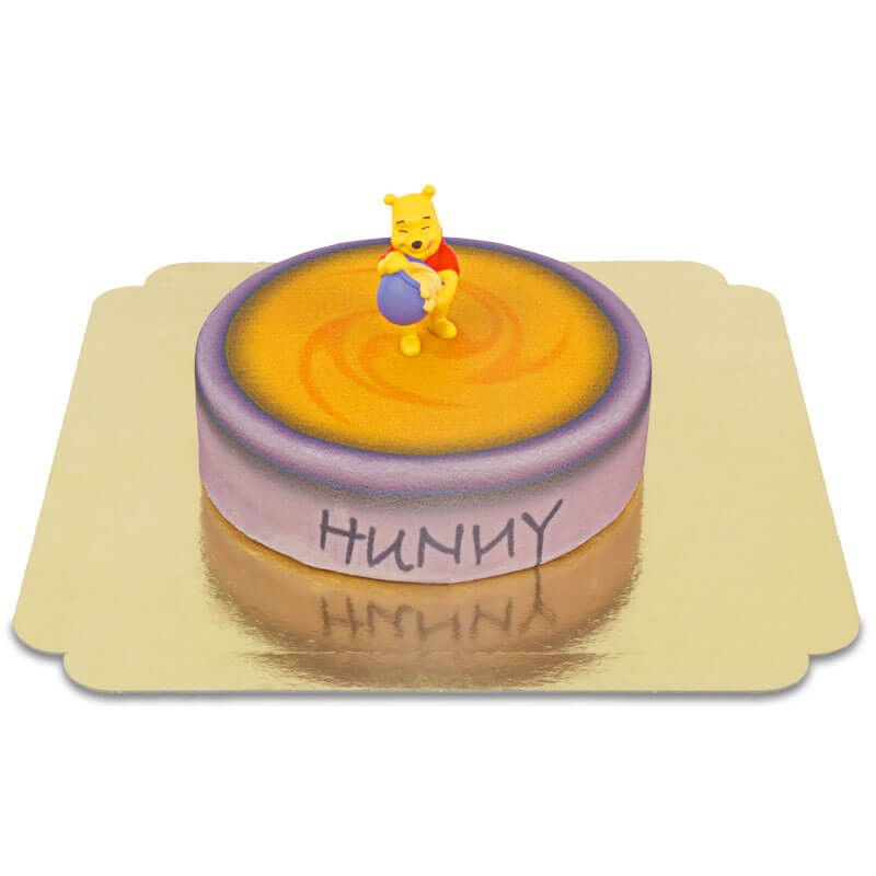 Winnie l'ourson sur gâteau pot de miel